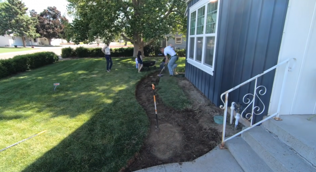 family renovating garden home